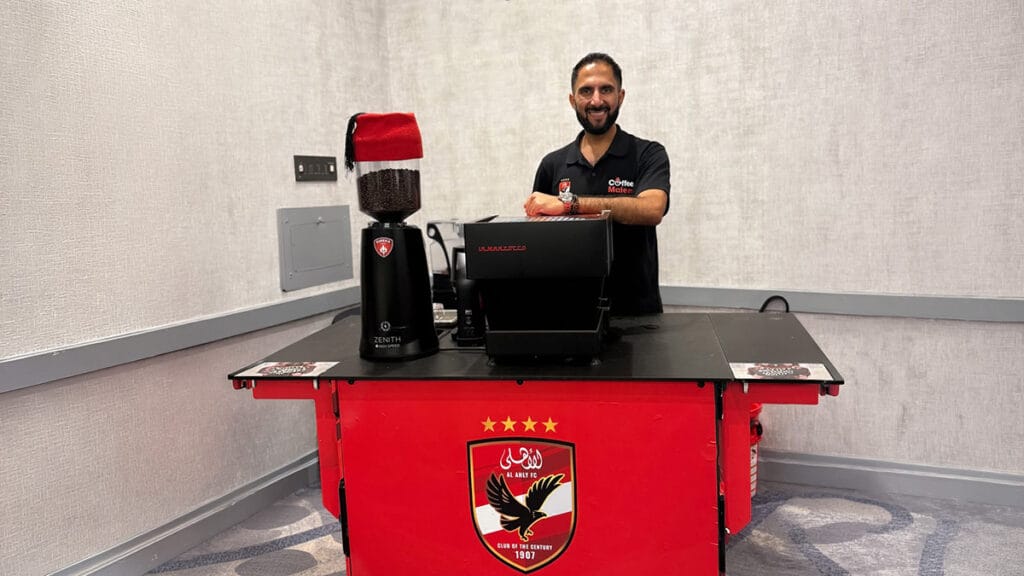 Amro Fadel behind the Al Ahly SC branded Coffee Malem cart during the 2025 FIFA Club World Cup