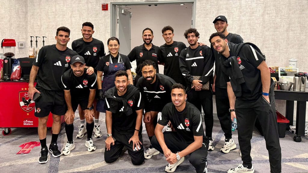 Amro Fadel with Al Ahly SC players and Coffee Malem staff during the 2025 FIFA Club World Cup