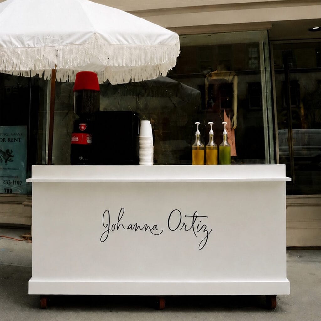 Coffee Malem branded coffee cart outside Johanna Ortiz on Madison Avenue in New York City