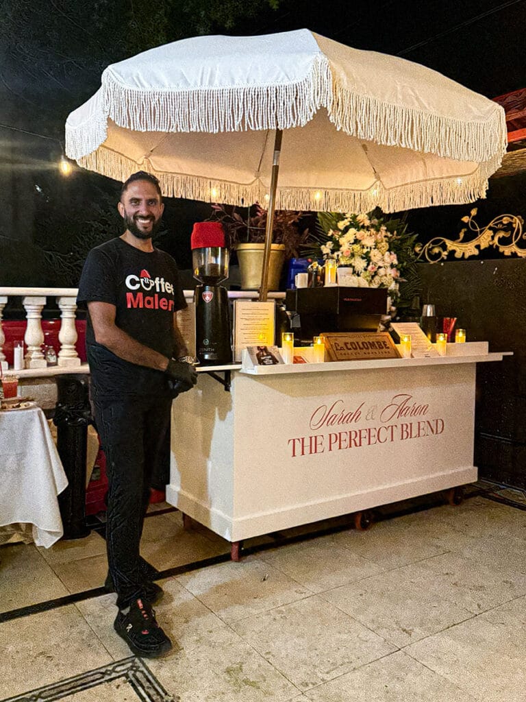Coffee Malem barista at an outdoor wedding coffee cart